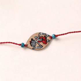 Pattachitra Handpainted Wooden Rakhi 42