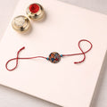 Pattachitra Handpainted Wooden Rakhi 47