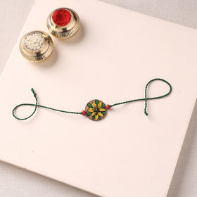 Pattachitra Handpainted Wooden Rakhi 48