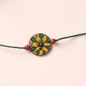 Pattachitra Handpainted Wooden Rakhi 48
