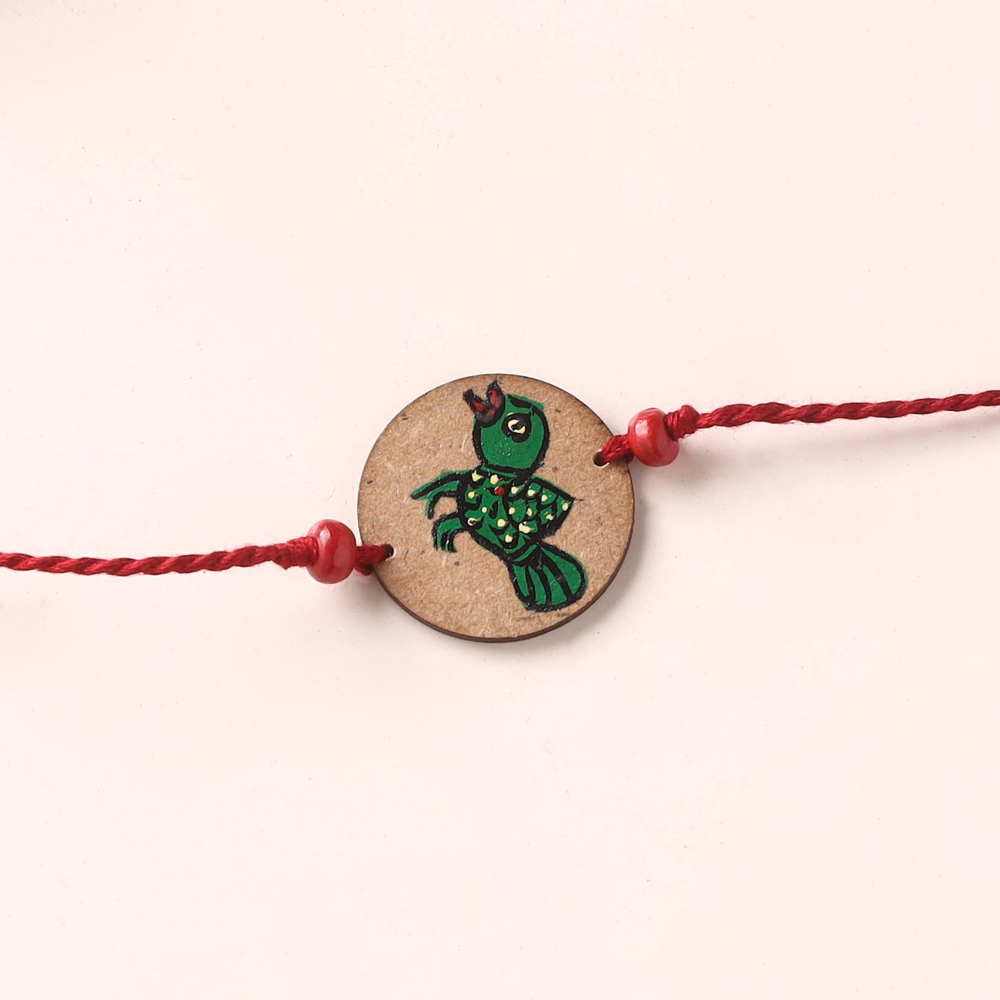 Pattachitra Handpainted Wooden Rakhi 49