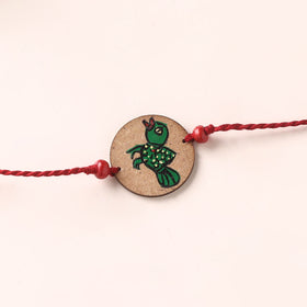 Pattachitra Handpainted Wooden Rakhi 49