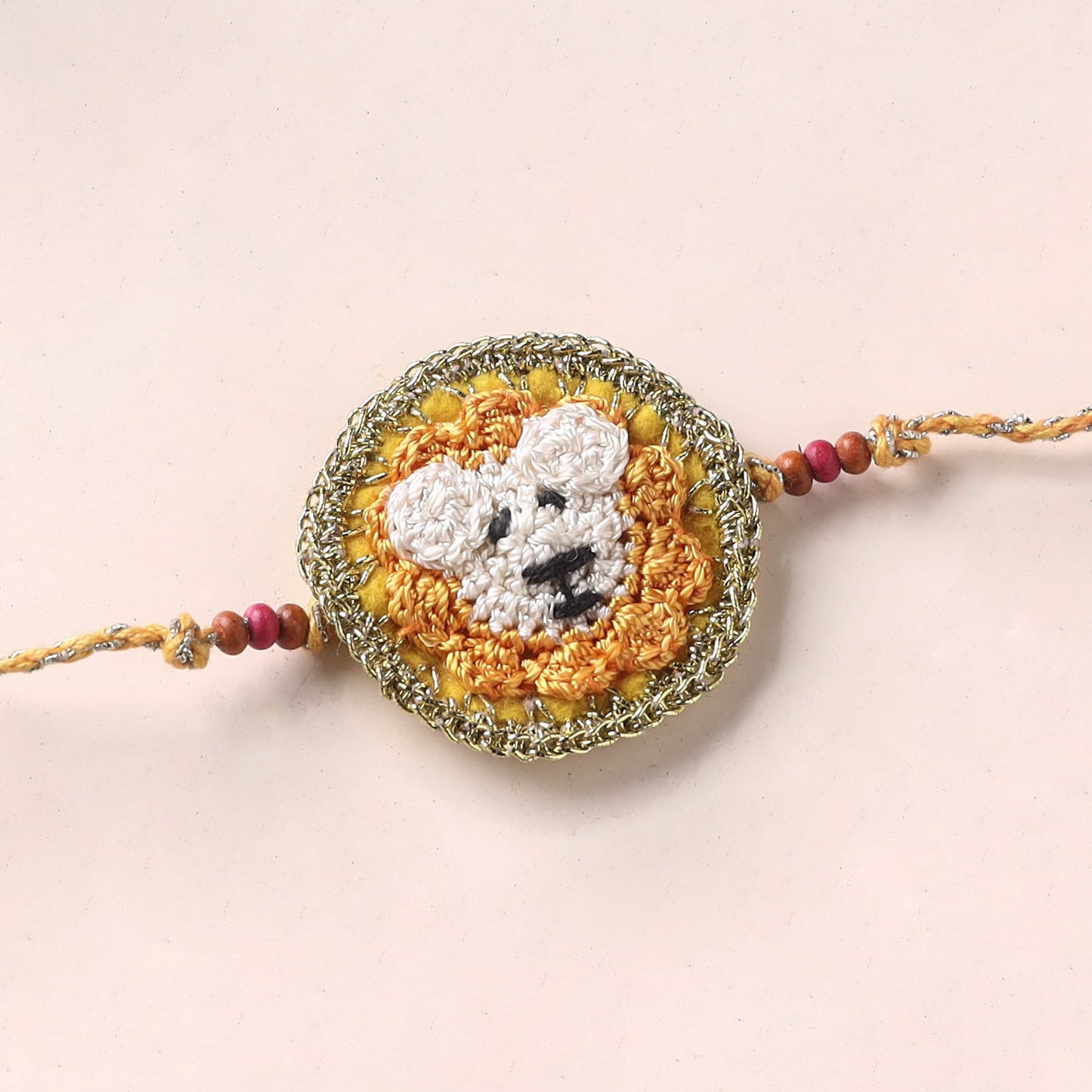 Lion - Handmade Crochet Rakhi by Samoolam 03