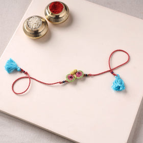Flower - Handmade Crochet Rakhi by Samoolam 11