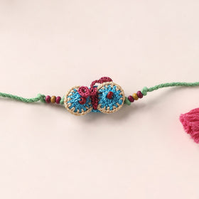 Flower - Handmade Crochet Rakhi by Samoolam
