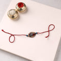 Pattachitra Handpainted Wooden Rakhi 16