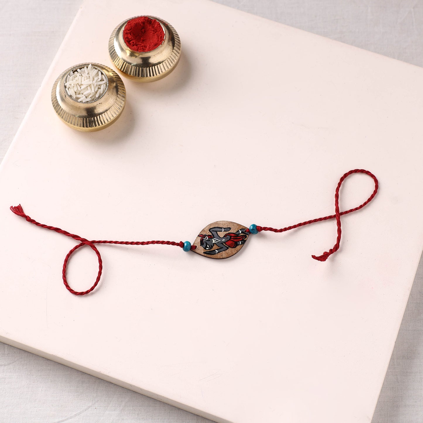 Pattachitra Handpainted Wooden Rakhi 16