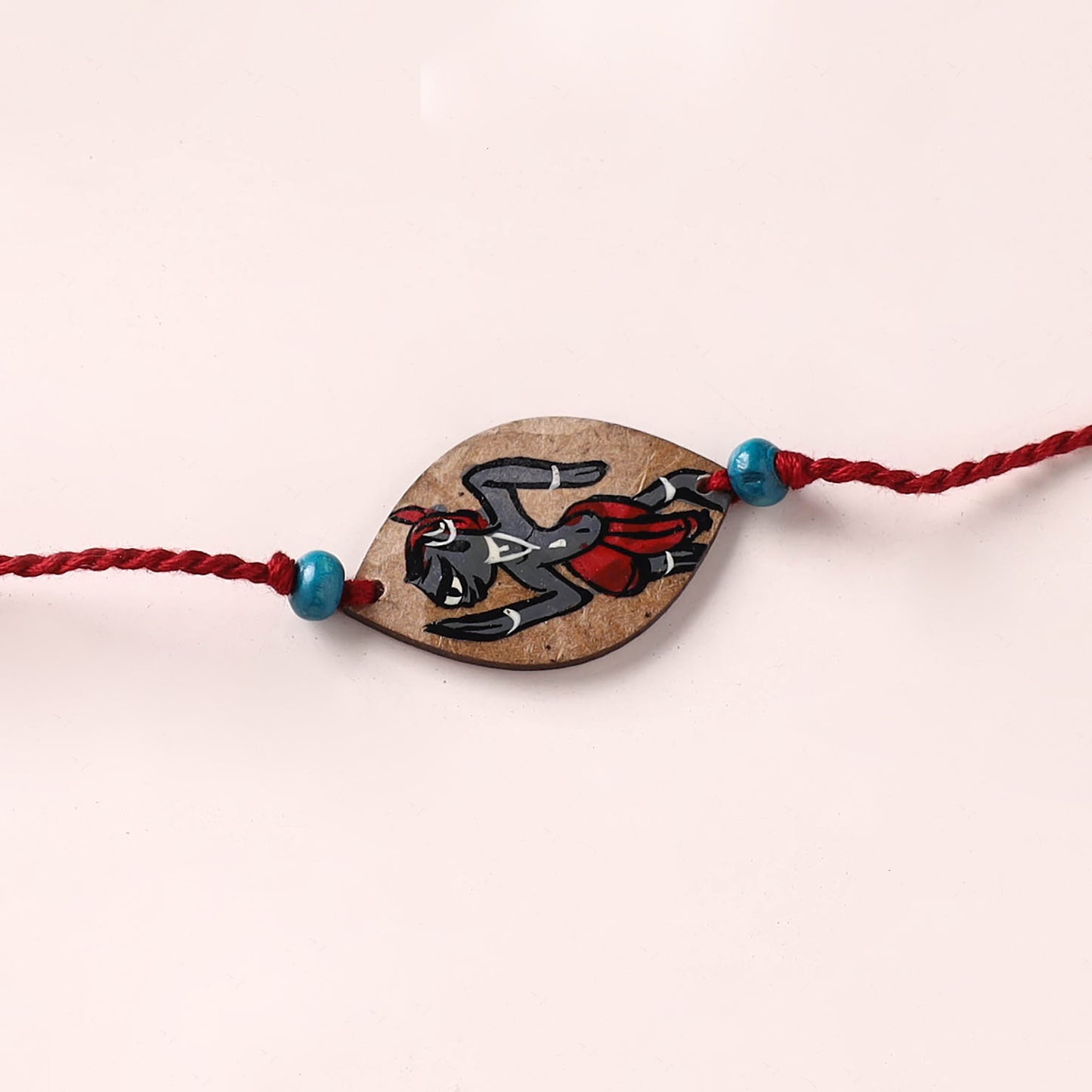 Pattachitra Handpainted Wooden Rakhi 16