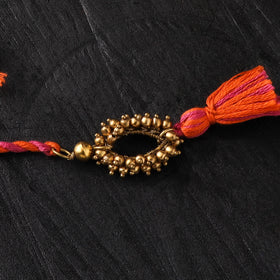 Tribal Dokra Brass Rakhi by Miharu 31