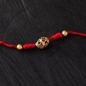 Tribal Dokra Brass Rakhi by Miharu 21
