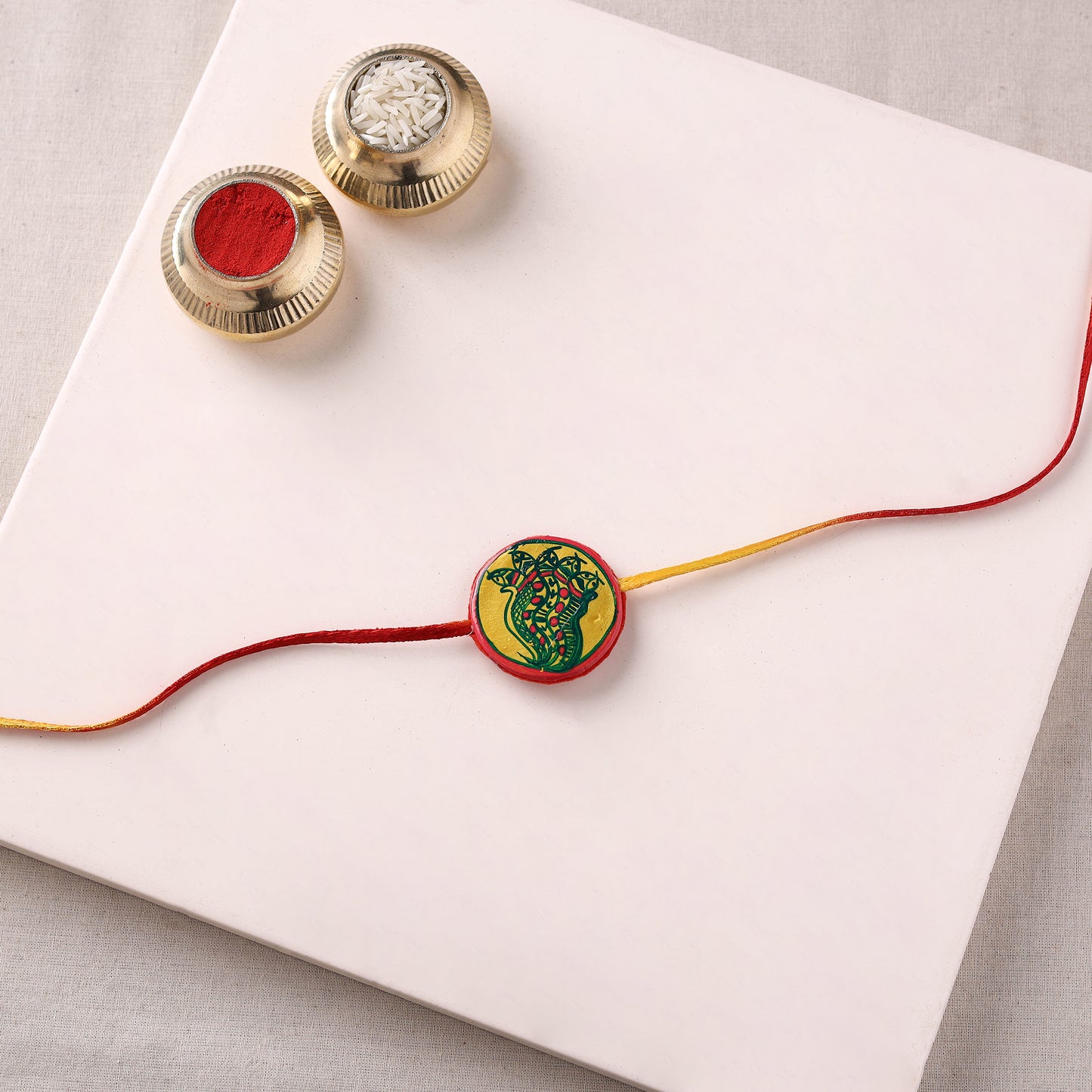 Manjusha Art Handpainted Resin Rakhi 02