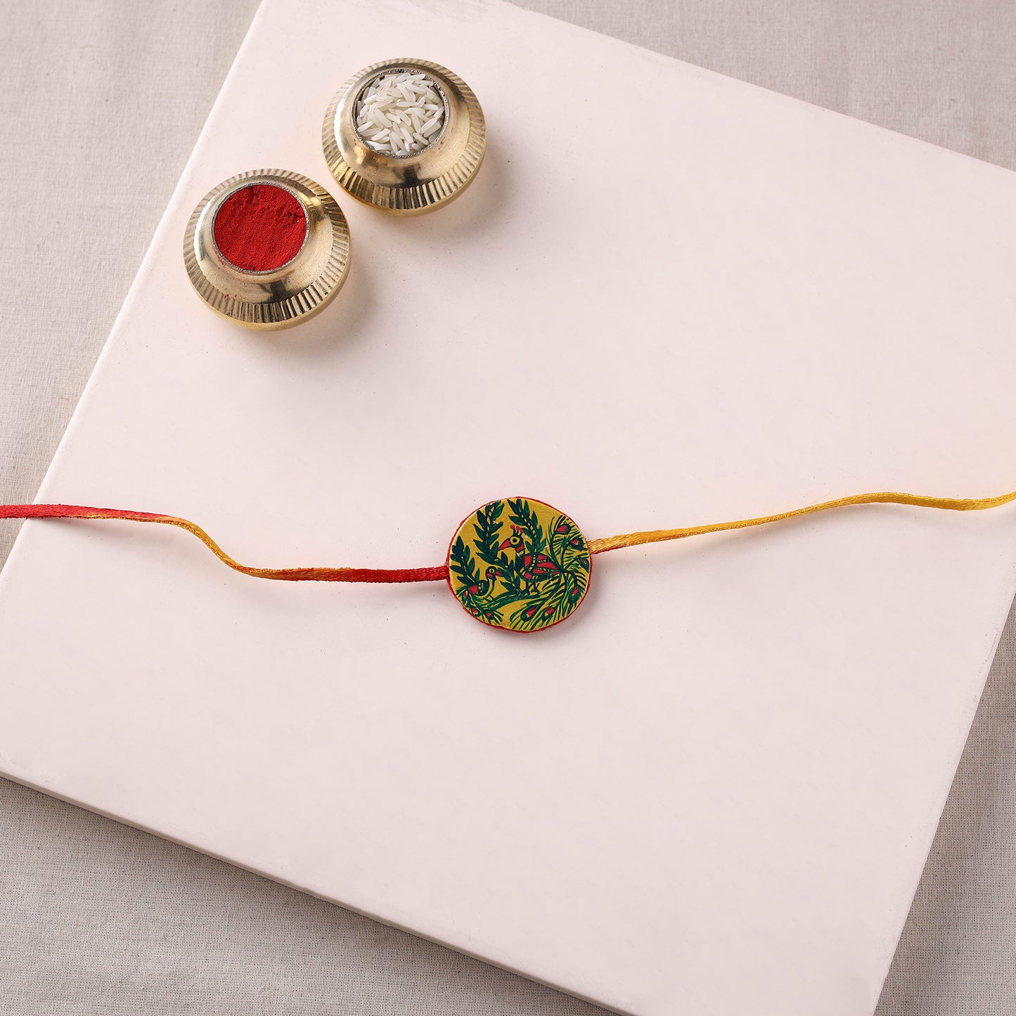 Manjusha Art Handpainted Resin Rakhi 05
