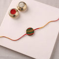 Manjusha Art Handpainted Resin Rakhi 07