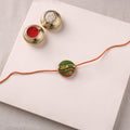 Manjusha Art Handpainted Resin Rakhi 12