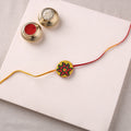 Manjusha Art Handpainted Resin Rakhi 14