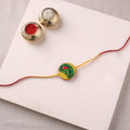 Manjusha Art Handpainted Resin Rakhi 30