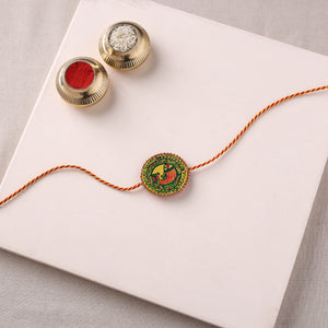 Reusable Manjusha Art Handpainted Resin Rakhi with Potli 38