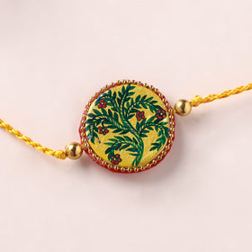 Manjusha Art Handpainted Resin Rakhi 48