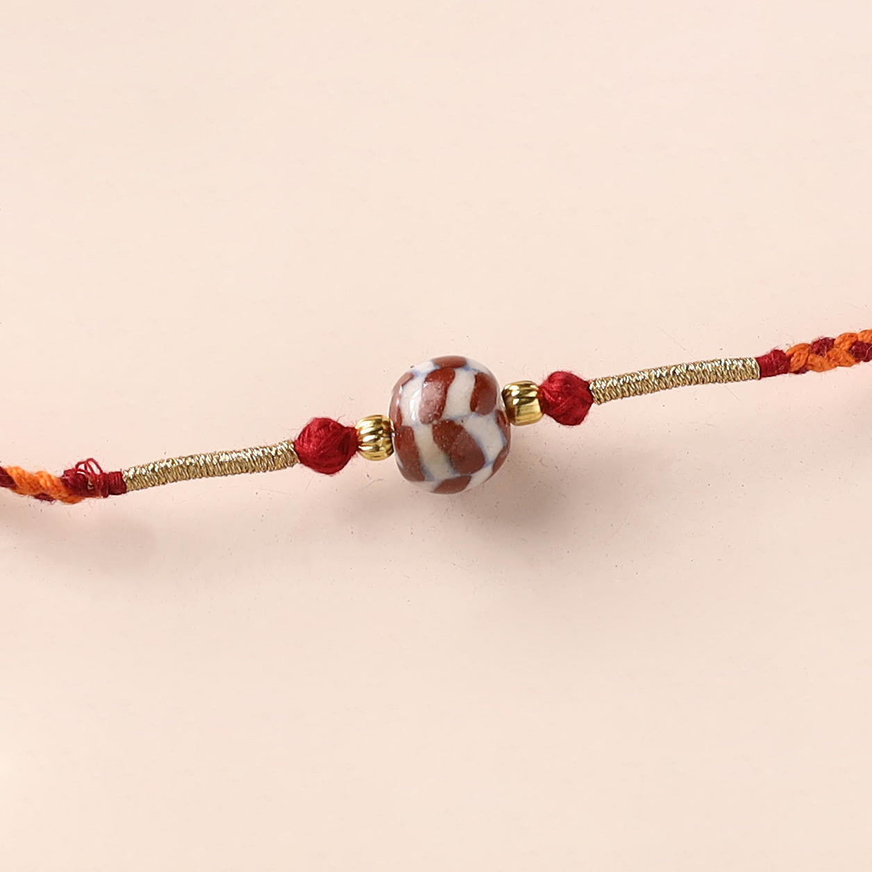Handcrafted Patwa Threadwork Blue Pottery Beads Rakhi 02