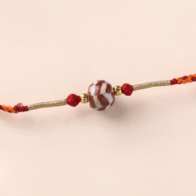Handcrafted Patwa Threadwork Blue Pottery Beads Rakhi 02