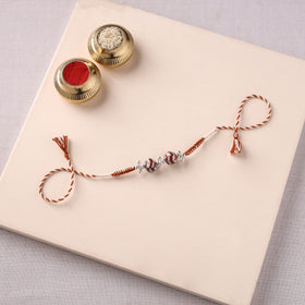 Handcrafted Patwa Threadwork Blue Pottery Beads Rakhi 04