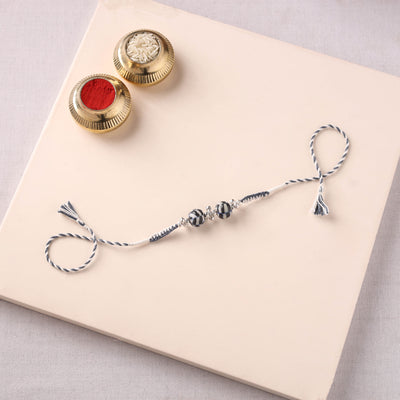 Handcrafted Patwa Threadwork Blue Pottery Beads Rakhi 05
