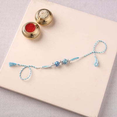 Handcrafted Patwa Threadwork Blue Pottery Beads Rakhi 06
