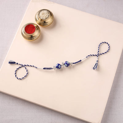 Handcrafted Patwa Threadwork Blue Pottery Beads Rakhi 07