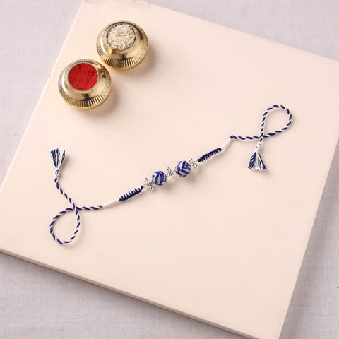 Handcrafted Patwa Threadwork Blue Pottery Beads Rakhi 09
