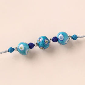 Handcrafted Patwa Threadwork Blue Pottery Beads Rakhi 11