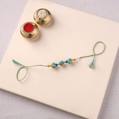 Handcrafted Patwa Threadwork Blue Pottery Beads Rakhi 13