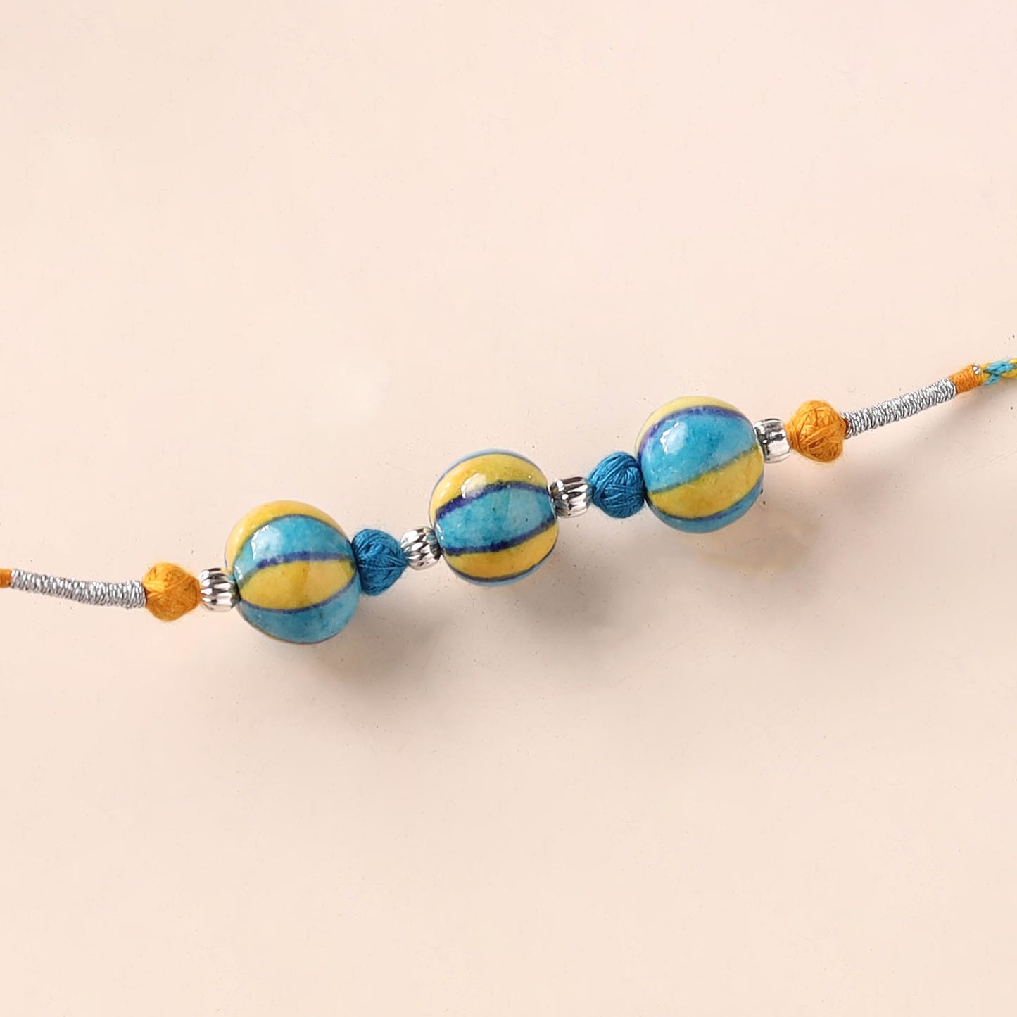 Handcrafted Patwa Threadwork Blue Pottery Beads Rakhi 13