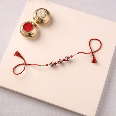 Handcrafted Patwa Threadwork Blue Pottery Beads Rakhi 14