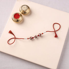 Handcrafted Patwa Threadwork Blue Pottery Beads Rakhi 14