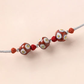 Handcrafted Patwa Threadwork Blue Pottery Beads Rakhi 14