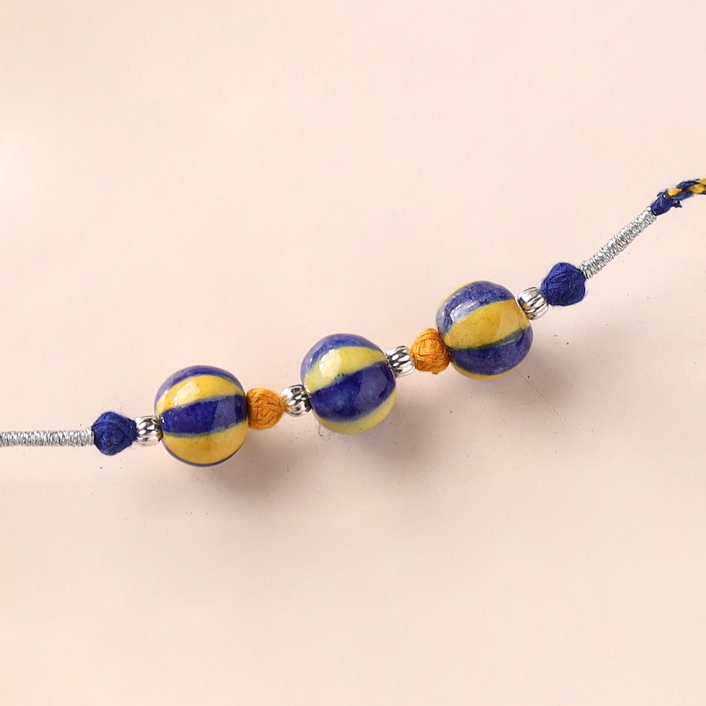 Handcrafted Patwa Threadwork Blue Pottery Beads Rakhi 15