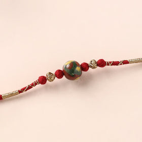 Handcrafted Patwa Threadwork Blue Pottery Beads Rakhi 16