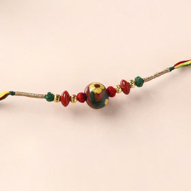 Handcrafted Patwa Threadwork Blue Pottery Beads Rakhi 24