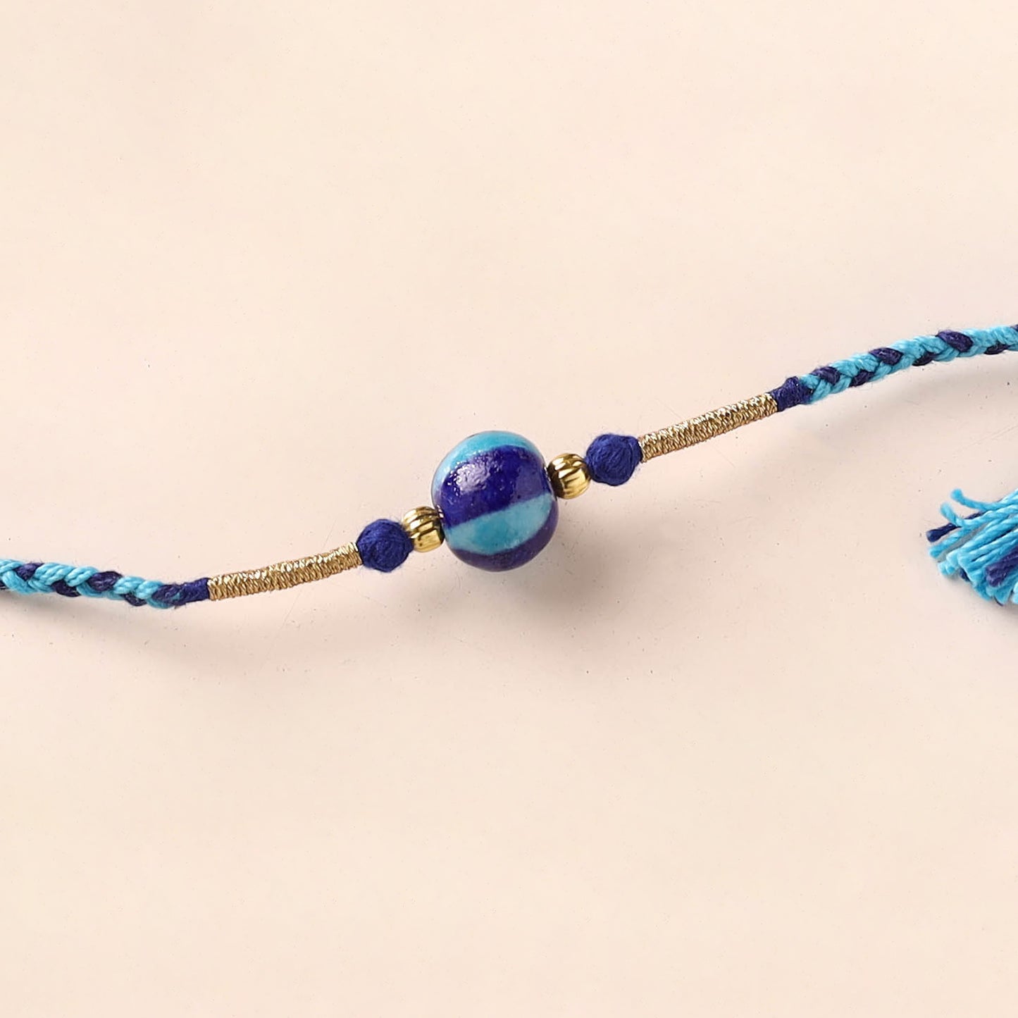 Handcrafted Patwa Threadwork Blue Pottery Beads Rakhi 26
