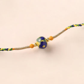 Handcrafted Patwa Threadwork Blue Pottery Beads Rakhi 28