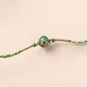 Handcrafted Patwa Threadwork Blue Pottery Beads Rakhi 30