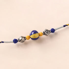 Handcrafted Patwa Threadwork Blue Pottery Beads Rakhi 31