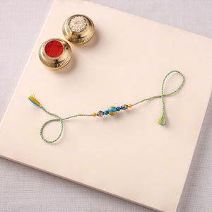 Handcrafted Patwa Threadwork Blue Pottery Beads Rakhi 33