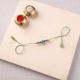 Handcrafted Patwa Threadwork Blue Pottery Beads Rakhi 32