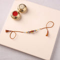 Handcrafted Patwa Threadwork Blue Pottery Beads Rakhi 34