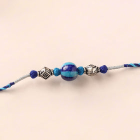 Handcrafted Patwa Threadwork Blue Pottery Beads Rakhi 35