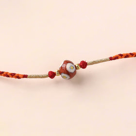 Handcrafted Patwa Threadwork Blue Pottery Beads Rakhi 39