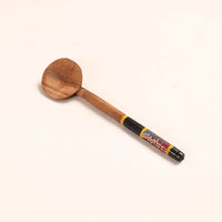 lacquered wooden spoon 