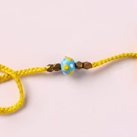 Tribal Odisha Dokra Brass & Threadwork Rakhi 06