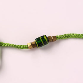 Tribal Odisha Dokra Brass & Threadwork Rakhi 08